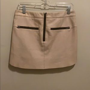 Pink leather mini skirt